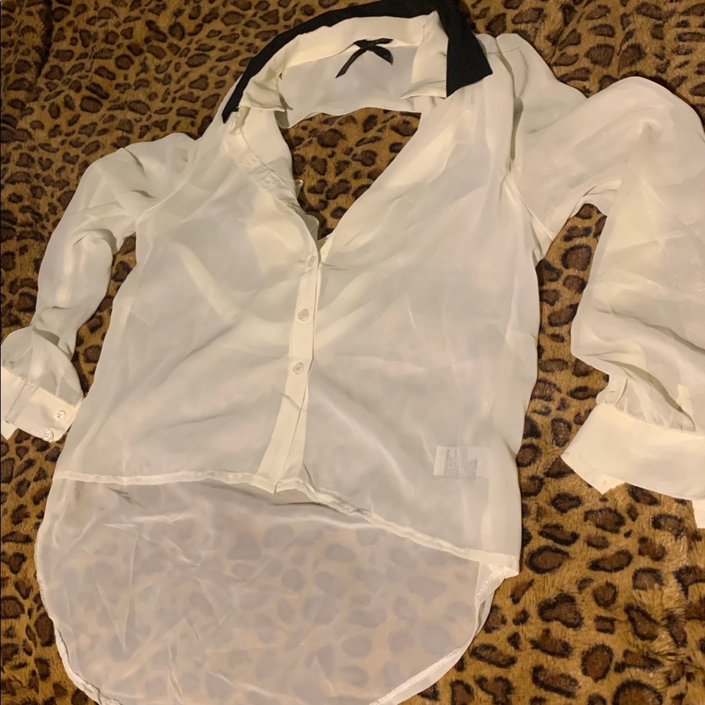 White sheer blouse with open cutout in back